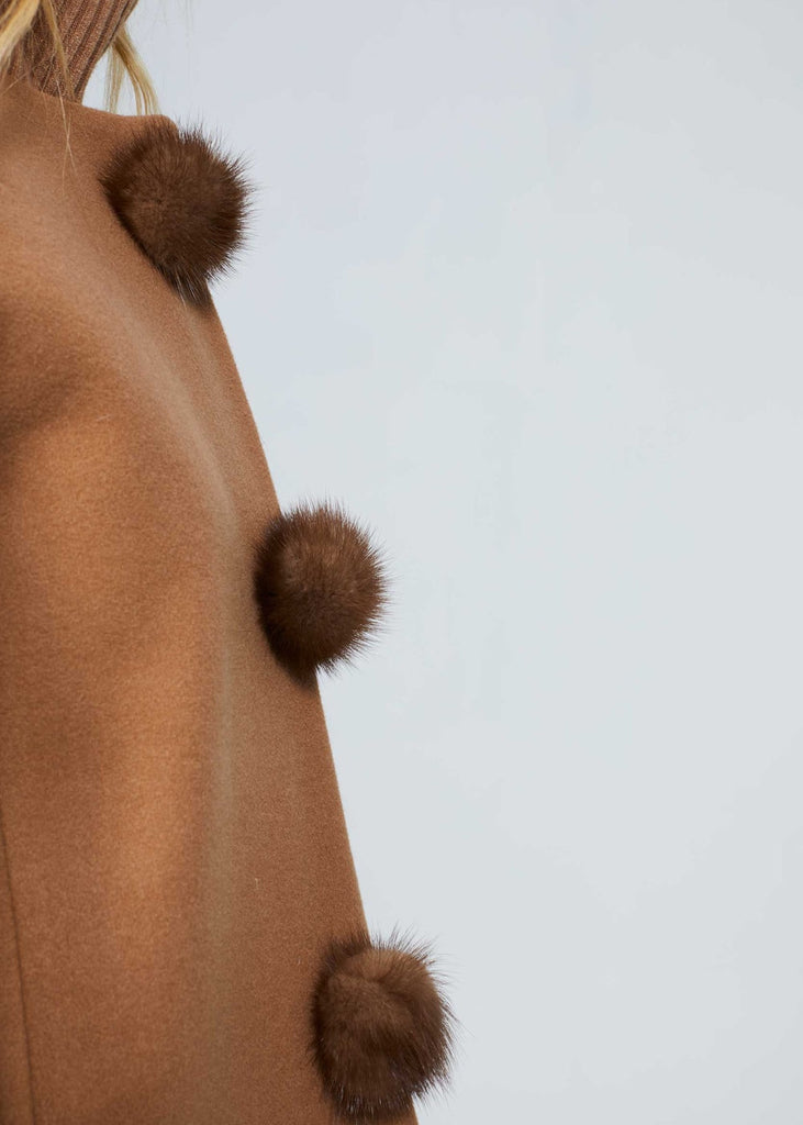 Manteau à boutons vison