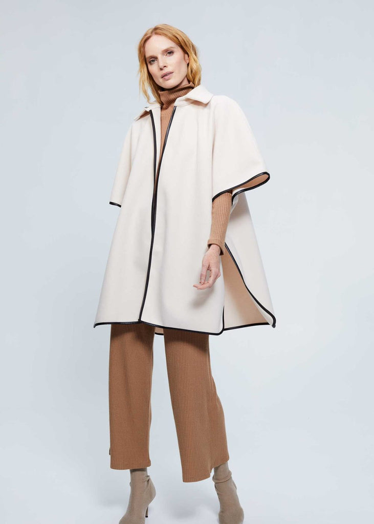 Manteau cape en maille