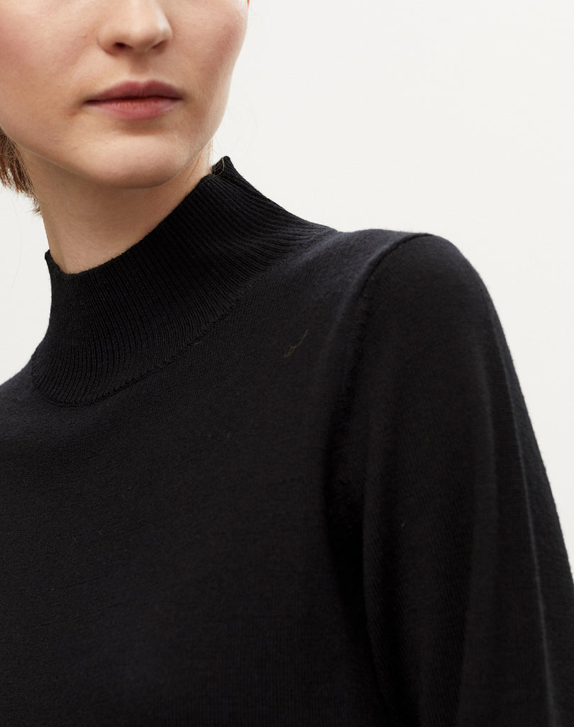 Pull col cheminé en laine